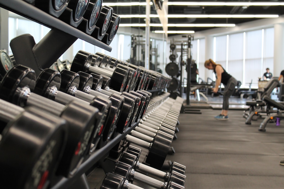 Modern gym floor with strength equipment